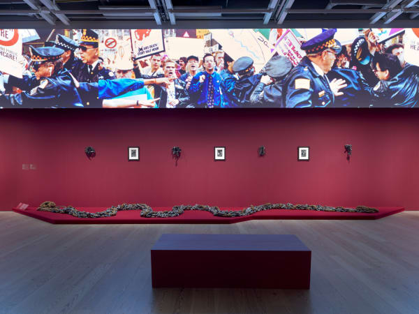 Installation view of Edges of Ailey (Whitney Museum of American Art, New York, September 25, 2024-February 9, 2025). From left to right: Maren Hassinger, River, 1972/2012; Melvin Edwards, Utonga (Lynch Fragment), 1988; Aaron Douglas, Bravado, 1926; Melvin Edwards, Chitungwiza from the Lynch Fragment series, 1989; Aaron Douglas, Flight, 1926; Melvin Edwards, Katura from the Lynch Fragment series, 1986; Aaron Douglas, Surrender, 1970; Melvin Edwards, Cup of? From the Lynch Fragment series, 1988. Photograph by Ron Amstutz