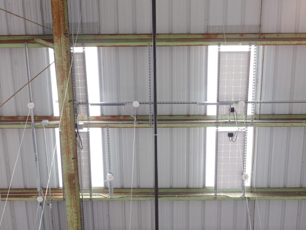 K.R.M. Mooney and McIntyre Parker Untitled, 2018 Digital transfer from 16mm film, 27 seconds Aluminum, generator, photovoltaic panels, projector, rubber, steel Projector case: 16 1/4 x 13 1/2 x 13 1/4 in 41.3 x 34.3 x 33.5 cm Photovoltaic panels: 24 x 48 in 61 x 121.9 cm