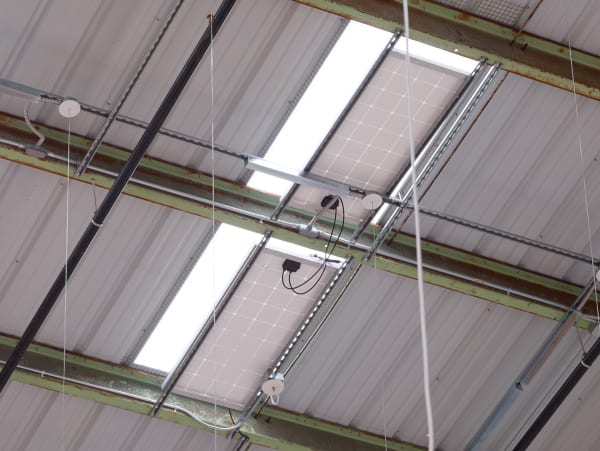 K.R.M. Mooney and McIntyre Parker Untitled, 2018 Digital transfer from 16mm film, 27 seconds Aluminum, generator, photovoltaic panels, projector, rubber, steel Projector case: 16 1/4 x 13 1/2 x 13 1/4 in 41.3 x 34.3 x 33.5 cm Photovoltaic panels: 24 x 48 in 61 x 121.9 cm