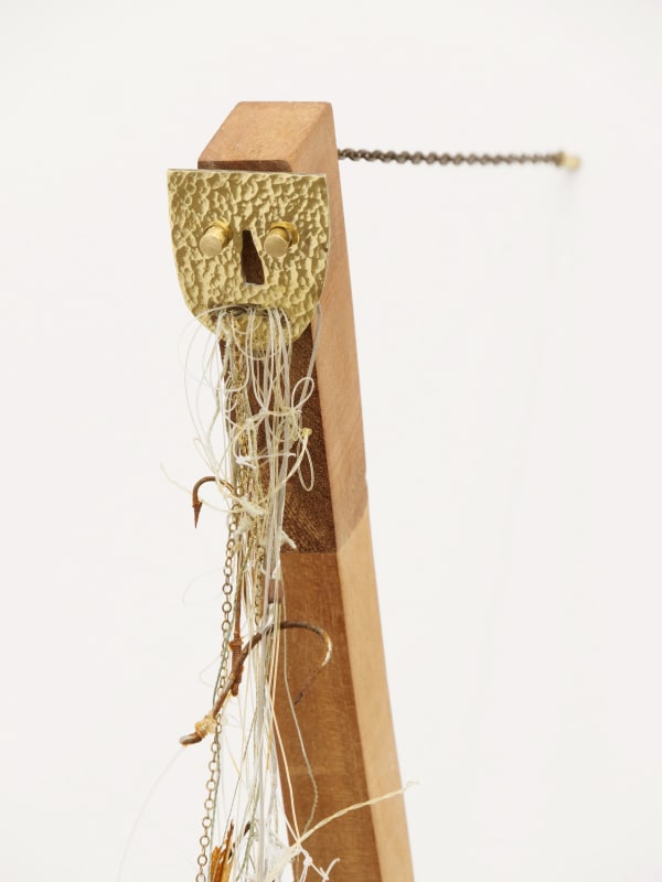 Will Rogan Self-portrait as the part of the door that needed to be removed so the door can close (detail), 2018 Brass, wood, fishing line, hooks, butterfly wings, flotsom 28 x 4 x 11 1/2 in 71.1 x 10.2 x 29.2 cm