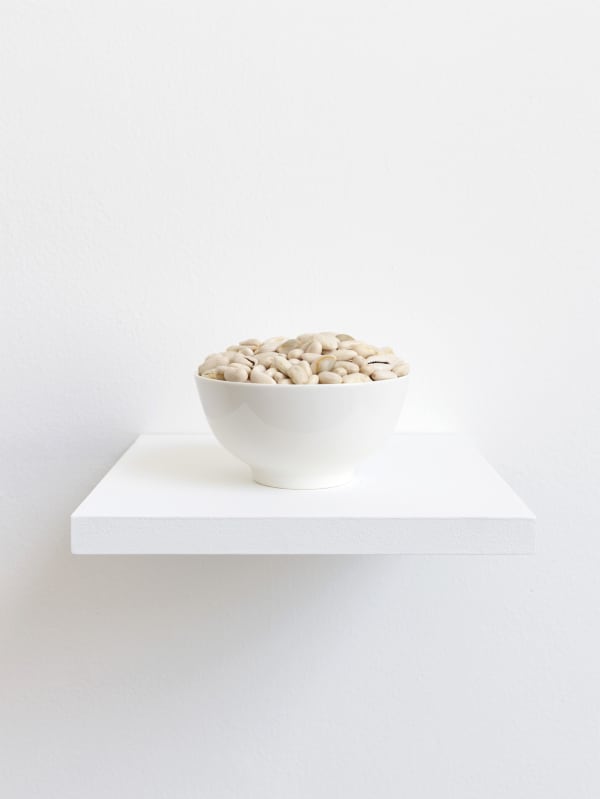 Zarouhie Abdalian Spoil, 2015 Beans, cowries, bowl Dimensions variable