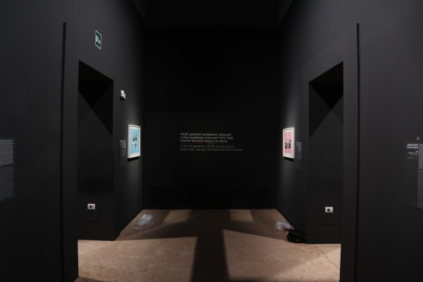 Banksy artwork hanging on wall