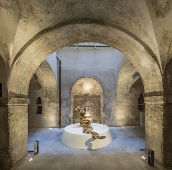 Banksy artwork hanging on wall