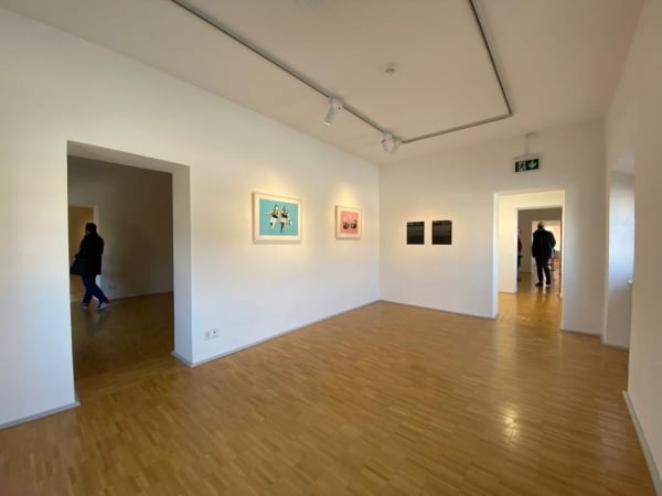 Banksy artworks hanging on wall