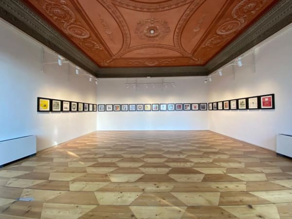 Banksy artworks hanging on wall