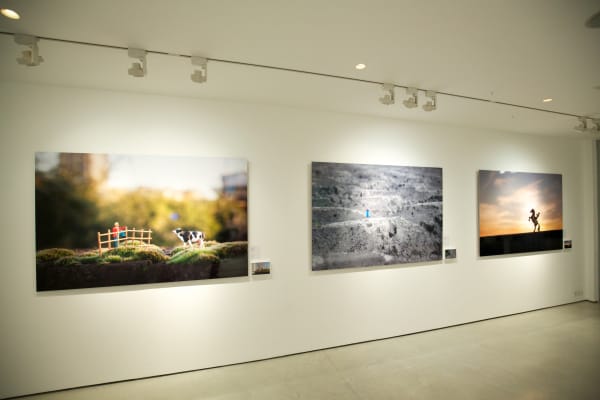Slinkachu prints hanging in exhibition at andipa gallery.
