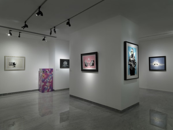 Banksy Exhibition installation, Prints hanging on the walls.