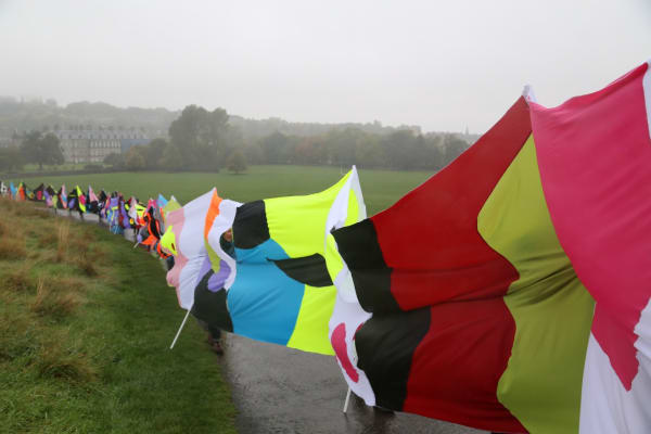 Jacob Dahlgren No Conflict no Irony (I Love the Whole World), 2013. The making of a 100 meter long banner and the walk to Salisbury Crags on 17 October 2013, Untied Kingdom.