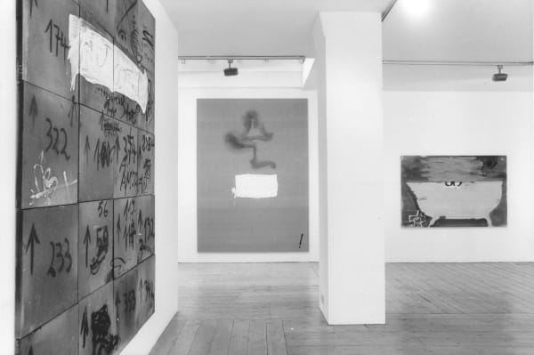 installation shot of an exhibition, in the ground floor gallery of Annely Juda Fine Art, of paintings, sculptures, drawings and prints by the Spanish artist Antoni Tapies.