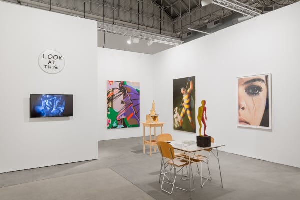 Installation view of EXPO Chicago with multiple artists exhibited.