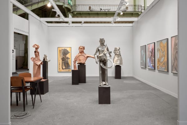 Matthew Monahan solo booth at FIAC filled with a variety of sculptures and paintings.