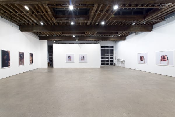 Installation view of Anne Collier's fourth solo show at Anton Kern Gallery. View of gallery with multiple works shown.