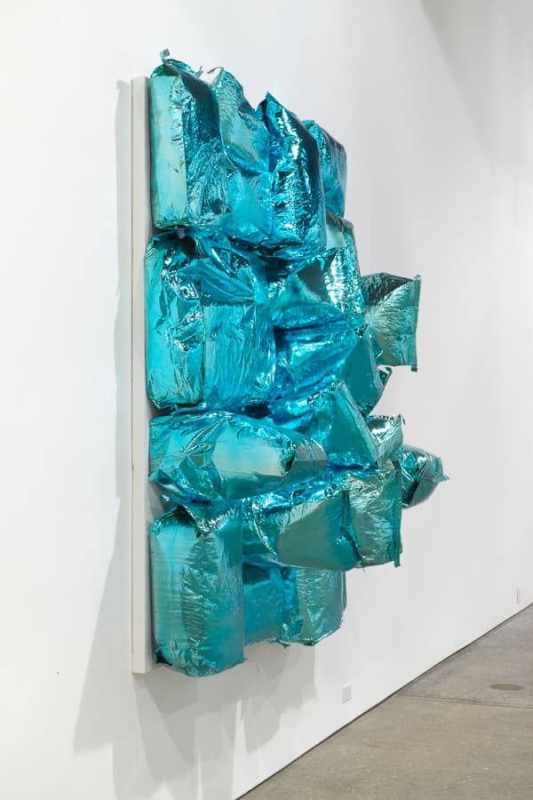 Installation view of Jim Lambie's solo exhibition. Detail of Hot Sky made mostly from potato bags.