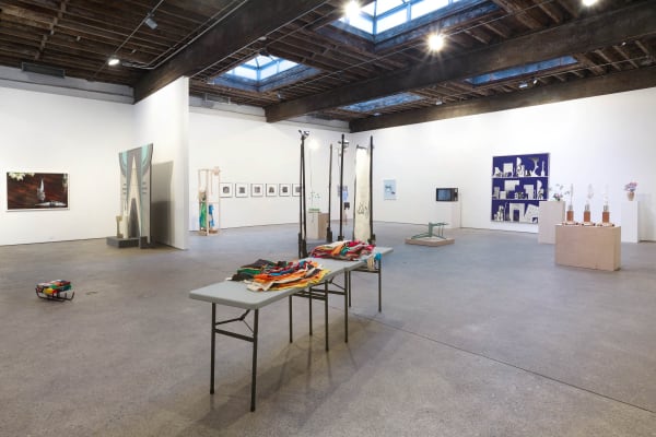 Installation view of the Matthew Higgs-curated show, Displayed. Many works included here, featuring most prominently Nancy Shaver's work.