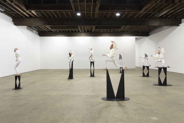 Installation view of Francis Upritchard's debut New York gallery show, featuring figurative and ritualistic sculptures as well as a collection of pots. The calming war zone that is Francis' collection of figures.