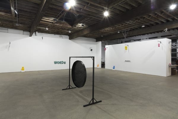 Installation view of David Shrigley's fifth solo show at Anton Kern Gallery, featuring signs. Some additional works.