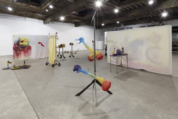 Installation view of Alessandro Pessoli's fifth solo show at Anton Kern Gallery. Hanging ceramic works.