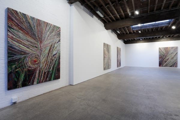 Installation view of Mark Grotjahn's solo show. Multiple works shown.
