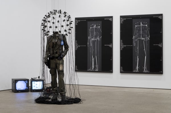 Installation view of Michael Joo's solo show. Sculpture titled Future Perfect with some oil works behind.