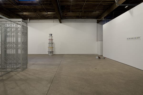 Installation view of Marepe's show entitled "Discompleto" consisting of sculpted works. A few sculptures featured.