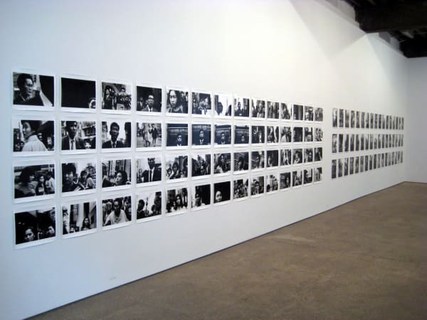 Installation view of Nobuyoshi Araki's first solo exhibition, consisting of diaristic photos from the 1960s and early '70s.