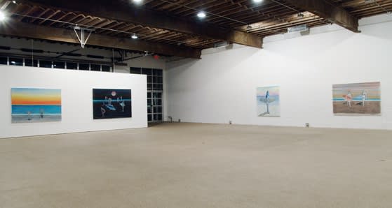 Installation view of Dan McCarthy's solo show at Anton Kern, featuring a group of beachside paintings and some portraits.