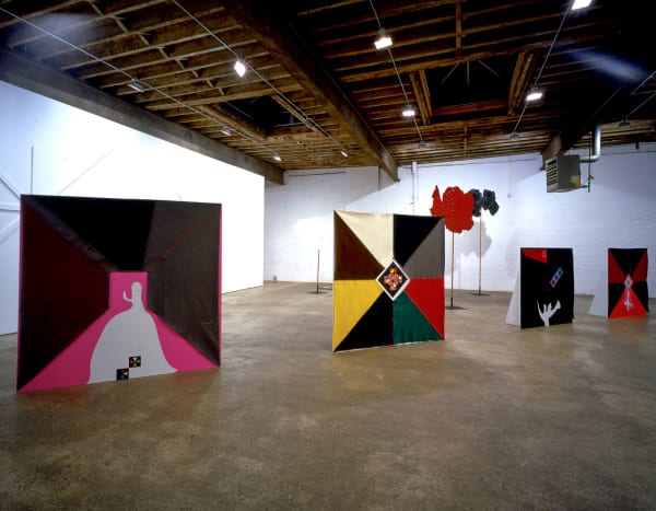 Installation view of Lothar Hempel's fourth solo show at Anton Kern Gallery, a theatrical installation of mixed media works, a video installation, and brain sculptures.