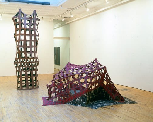 Installation view of Lara Schnitger's show, featuring sculptures and c-type photographs.