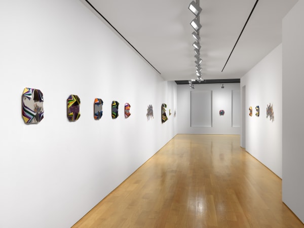 Installation view of Jim Lambie's works on the 3rd floor of the gallery featuring many of the smaller works in the show.