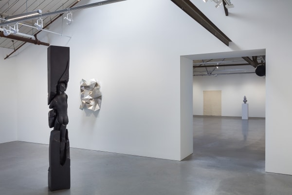 Installation view of the group show coordinated by Kreps and Kern Galleries, featuring many artists. Two Monahan sculptures featured.