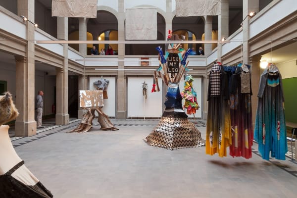 Installation view of Lara Schnitger's show at Basel Parcours, featuring a large body of works as well as a procession through Mezzeplatz. Schnitger's standing sculptural works.