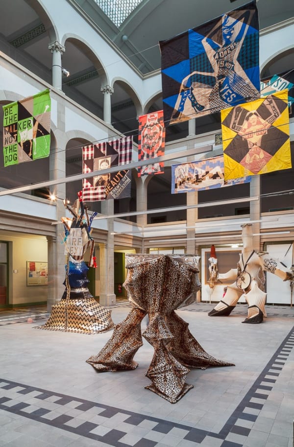 Installation view of Lara Schnitger's show at Basel Parcours, featuring a large body of works as well as a procession through Mezzeplatz. View from below: multiple works featured.