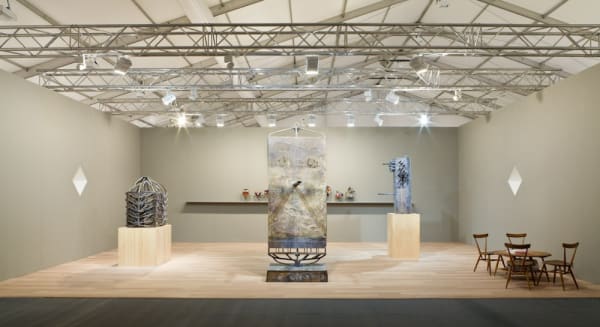 Installation view of Anton Kern Gallery's booth at Frieze London 2014. The show featured Mark Grotjahn and Tabwa Masks.