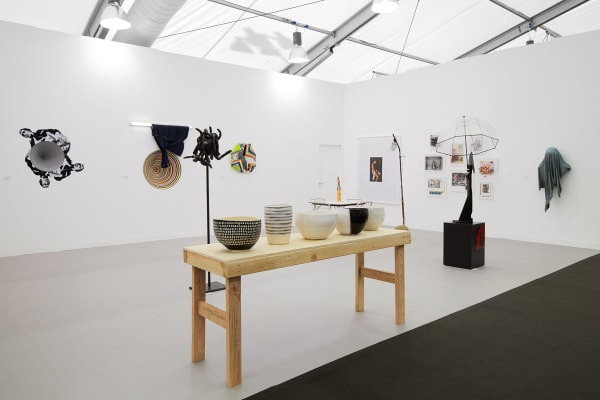 Installation view of the Anton Kern booth at Frieze London 2012. Shio Kusaka's ceramic pots featured at the front of the booth.