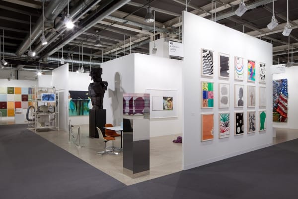 Installation view of the Anton Kern Booth at Basel 2011. Entrance into the booth, many works featured.