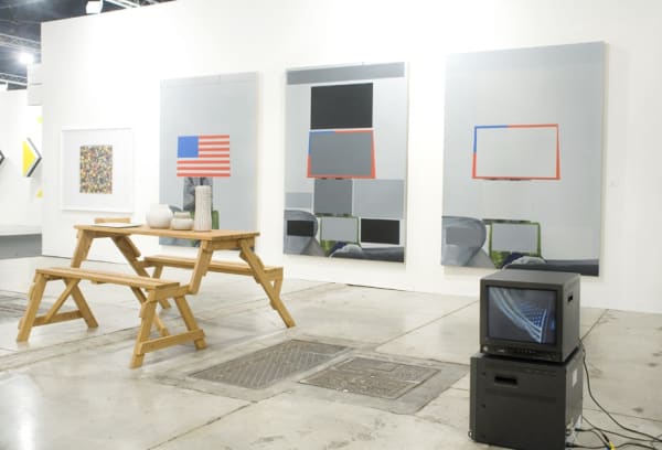 Installation view of the Anton Kern booth at Art Basel Miami 2010. Eberhard Havekost's brilliant triptych and Michael Joo's video installation featured.