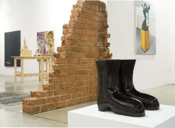 Installation view of the Anton Kern booth at Art Basel Miami 2010. Detail of Shrigley's rainboots.