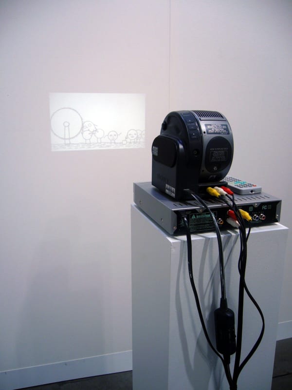 Installation view of the booth at Art Basel Miami 2007. Detail of Shrigley's animation.