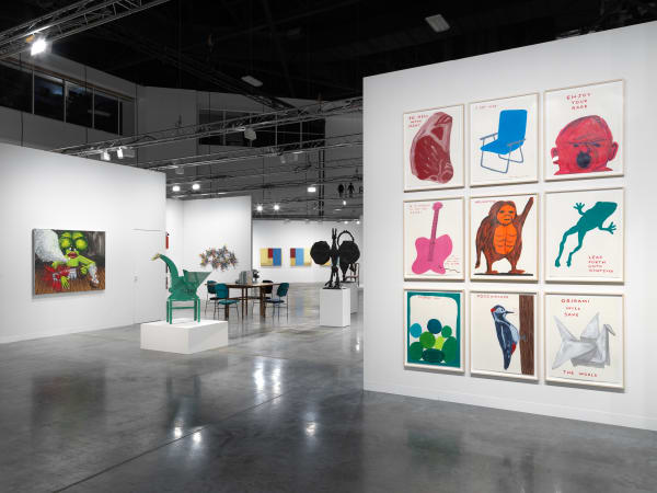 Installation view of Basel Miami booth day two hang. The entire booth with Shrigley wall on the outside.
