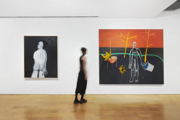 Install of two paintings with scale.
