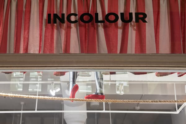 Installation view of the 2022 exhibition “Ryan Wilde's Circus of Solitude” at WINDOW with exterior view of walls and artworks.