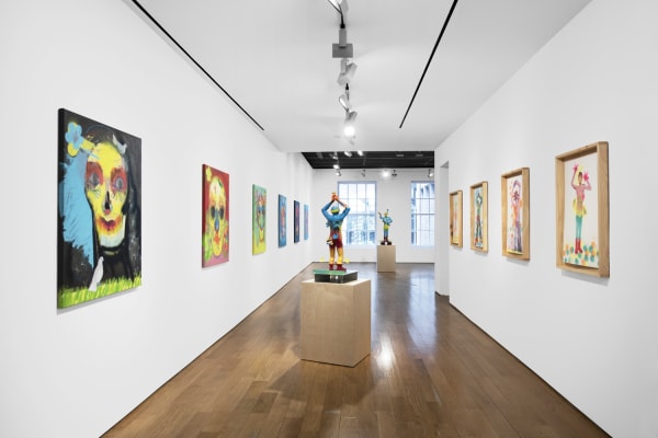 Installation view of the 2023 exhibition “Alessandro Pessoli: Pluto is my Master” with view of wood floors, walls, artworks and ceiling.