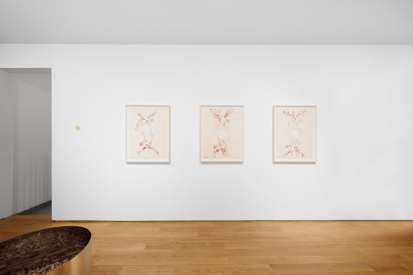 Installation view of the 2023 exhibition “Tondo” with view of wood floors, walls, artworks and ceiling.