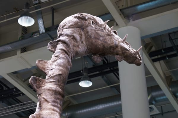 Installation view of Art Basel Unlimited 2023 with detail view of artwork by Francis Upritchard.