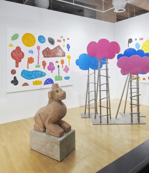 Installation view of the 2023 exhibition “Olaf Breuning: Storm” with view of wood floors, walls, artworks and ceiling.