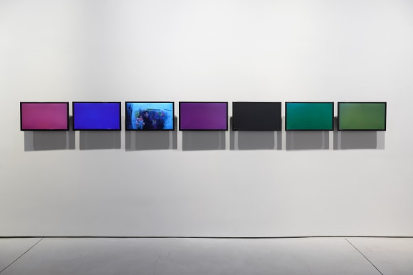 Jim Lambie's installation at the gallery 'Skin Shape' featuring ladders and other works.