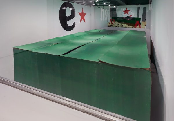 Installation view of Erik van Lieshout's exhibition at the gallery 'BEER' -- featuring an immersive Heineken installation and new collages. A look at the immersive exhibit revolving around beer.