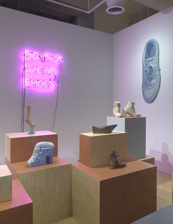Installation view at WINDOW-Walker side close-up majority of shoes pictured.