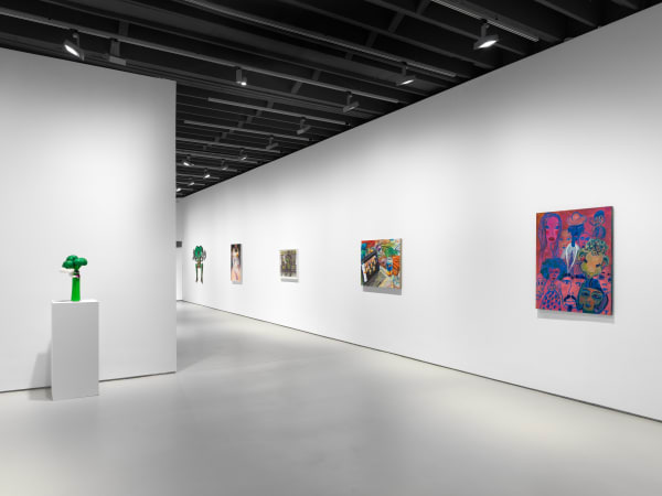 Installation view of "11".a group exhibition of artists at the gallery. Many works presented in an angular shot.