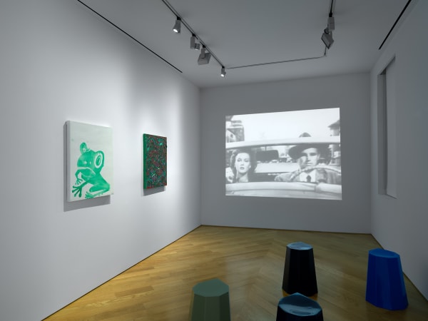 Third floor viewing room with Chris Martin works and movies.